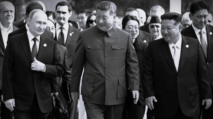 APTOPIX China Parade Chinese President Xi Jinping, Russia's Vladimir Putin, and North Korea's Kim Jong Un arrive at a military parade in Beijing, China, on Sept. 3, 2025.